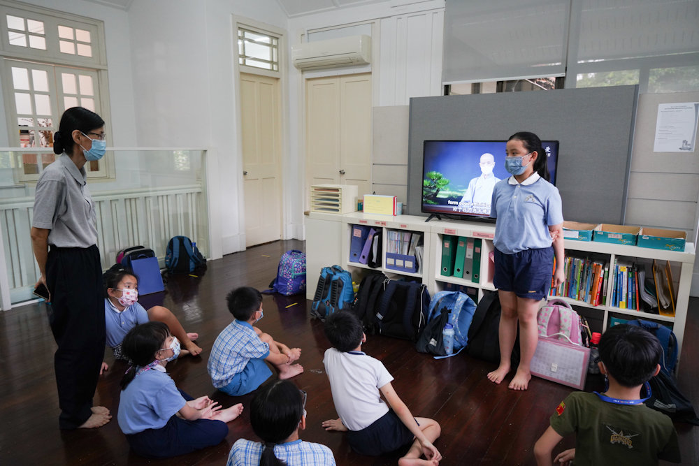 Primary Two student Krystal Ku sharing her thoughts about vegetarianism. (Photo by Chan May Ching)